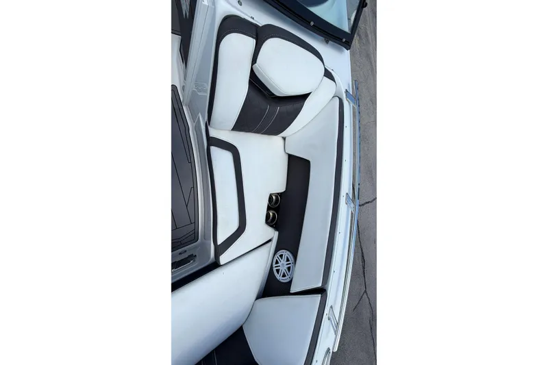 Slide: The Image of Interior of 2023 Monterey 238SS Super Sport boat with white and black seating. - 37