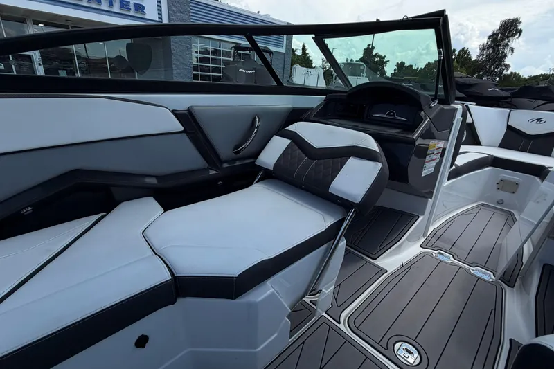 Slide: The Image of 2023 Monterey 238SS Super Sport boat interior with sleek seating and modern design. - 27