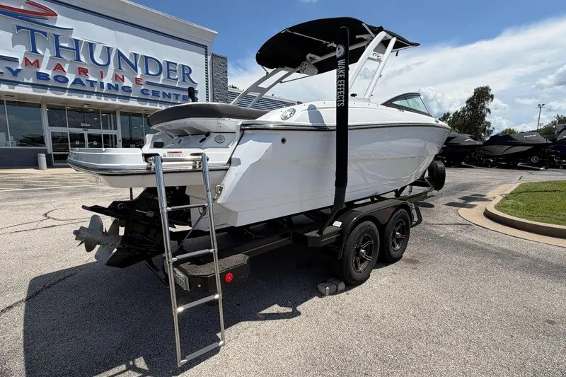Slide: The Image of 2023 Monterey 238SS Super Sport boat on trailer at Thunder Marine dealership. - 11