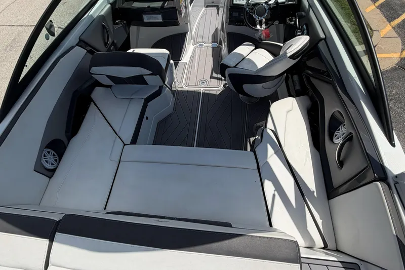 Slide: The Image of 2023 Monterey 238SS Super Sport boat interior with sleek seating and modern design. - 20