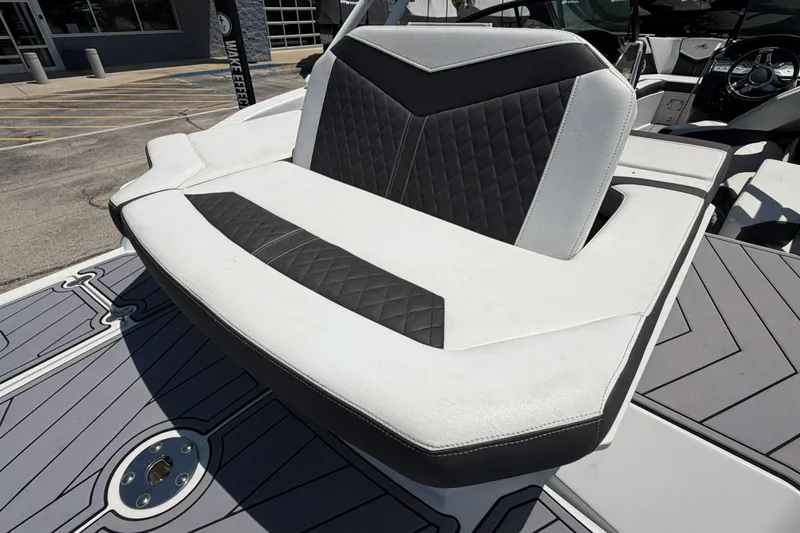 Slide: The Image of 2023 Monterey 238SS Super Sport boat seat with black and white upholstery. - 43