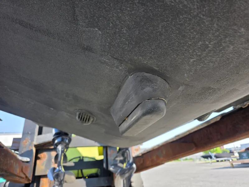 Slide: The Image of Close-up of the hull of a Grady-White Gulfstream 232 boat on a trailer. - 29