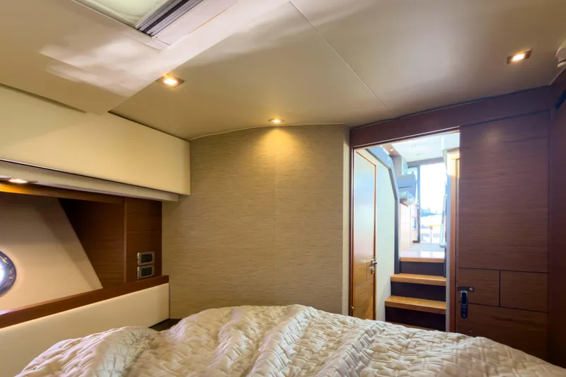 Slide: The Image of Luxurious interior cabin of 2017 Tiara Yachts C39 Coupe with modern design and cozy bedding. - 19