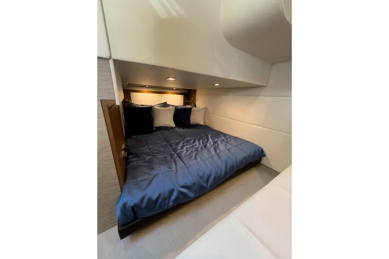 Slide: The Image of Luxurious cabin interior of 2017 Tiara Yachts C39 Coupe with cozy bedding. - 22