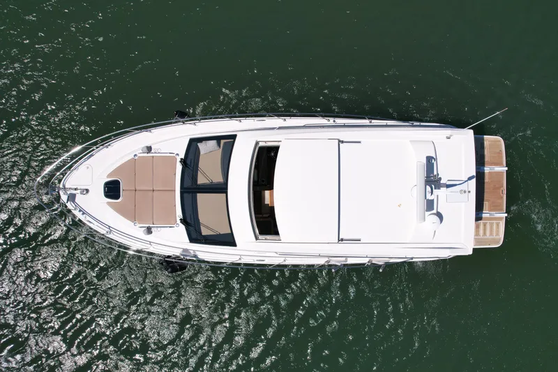 Slide: The Image of Aerial view of 2016 Sea Ray Sundancer 400 yacht on water. - 9
