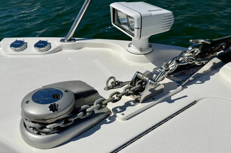 Slide: The Image of Anchor chain and winch on 2016 Sea Ray Sundancer 400 yacht deck. - 61