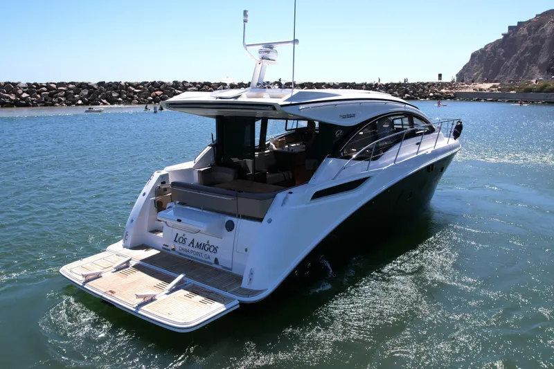 Slide: The Image of 2016 Sea Ray Sundancer 400 yacht cruising in sunny coastal waters. - 7