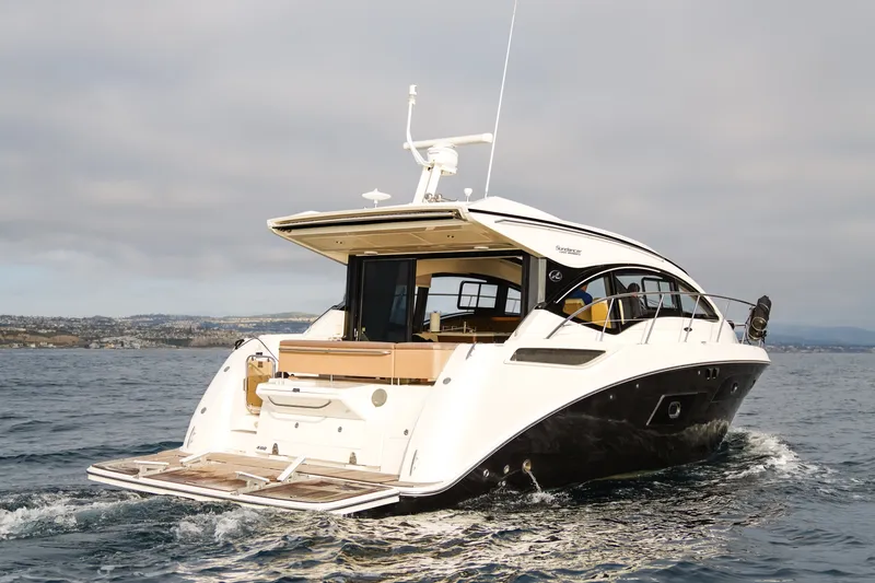 Slide: The Image of 2016 Sea Ray Sundancer 400 yacht cruising on open water. - 3