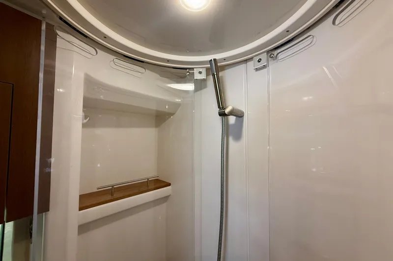 Slide: The Image of Shower area inside 2016 Sea Ray Sundancer 400 yacht, featuring sleek design and modern fixtures. - 40