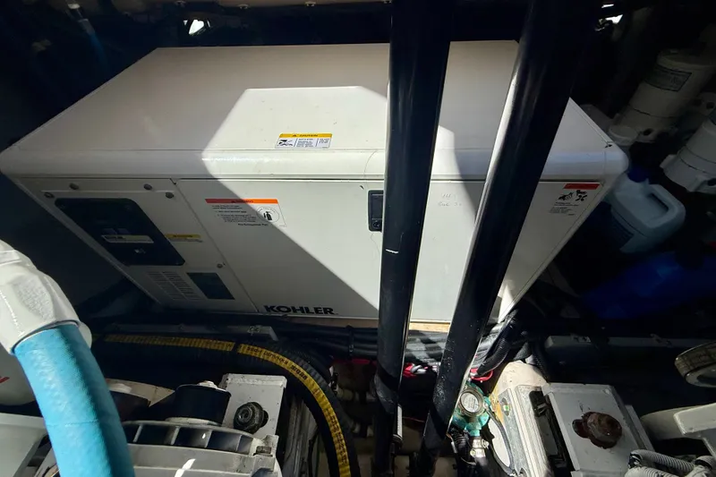 Slide: The Image of Engine room of 2016 Sea Ray Sundancer 400 with Kohler generator. - 66