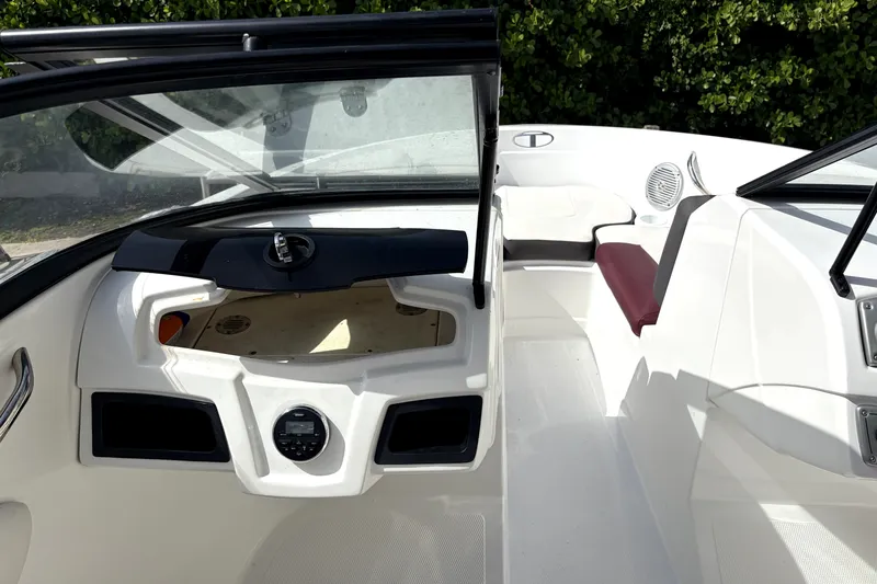Slide: The Image of Interior view of a 2019 Tahoe 550 TS boat, featuring sleek design and seating. - 15