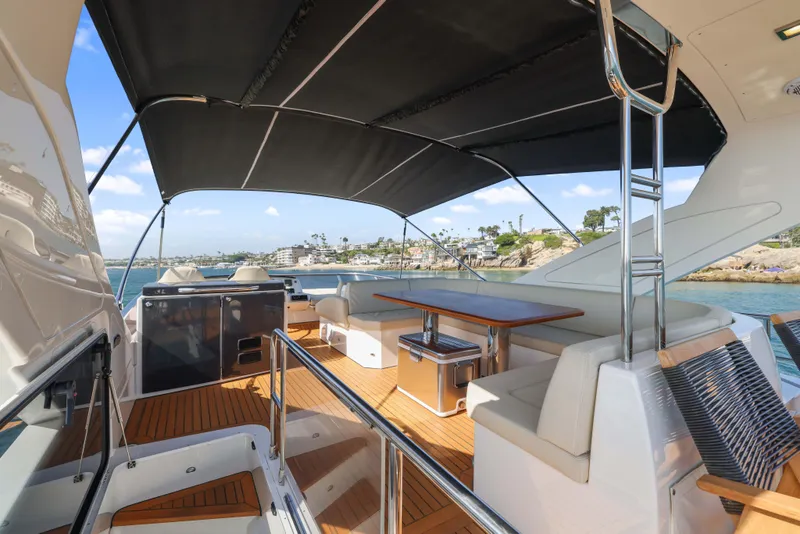 Slide: The Image of Luxurious 2015 Absolute Fly Co Ownership yacht with spacious deck and seating area. - 44