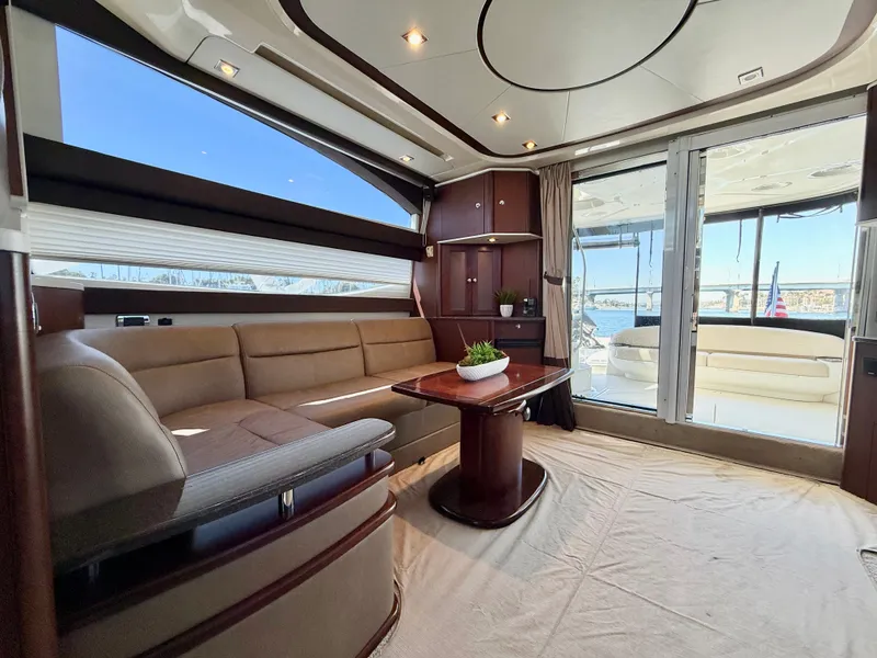 Slide: The Image of Interior of a 2014 Meridian 441 Sedan with elegant seating area and large window. - 12
