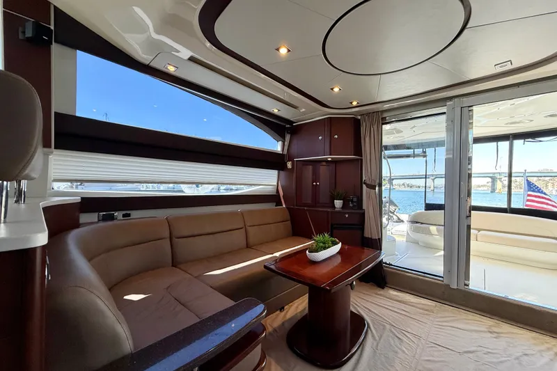 Slide: The Image of Interior of a 2014 Meridian 441 Sedan with elegant seating area and large windows. - 11