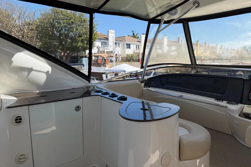Slide: The Image of The image shows the cockpit of a 2014 Meridian 441 Sedan with sleek seating and helm console. - 40