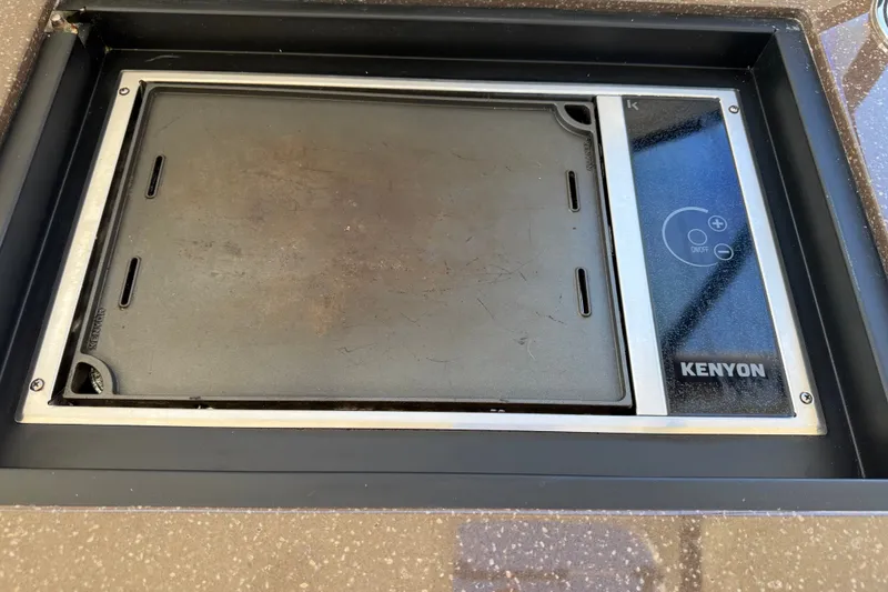 Slide: The Image of A built-in Kenyon grill on a 2014 Meridian 441 Sedan. - 42