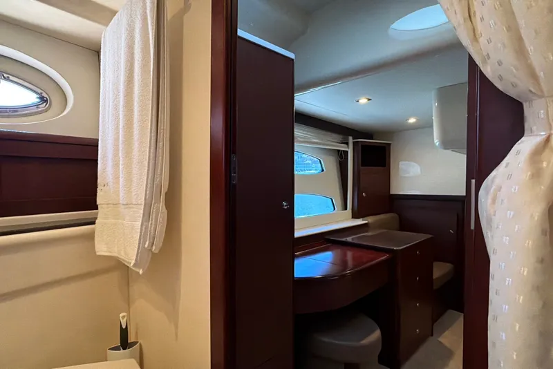 Slide: The Image of Interior of a 2014 Meridian 441 Sedan with elegant wood finishes and a cozy seating area. - 34