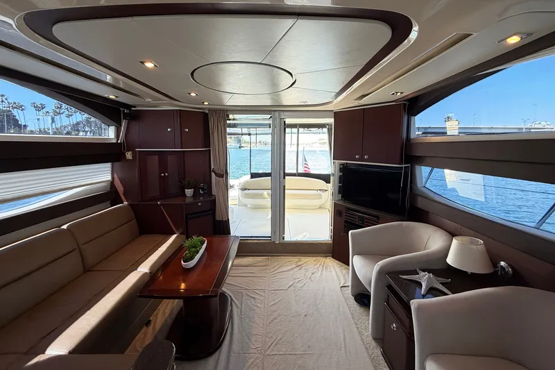 Slide: The Image of Interior of a 2014 Meridian 441 Sedan with elegant furnishings and a view of the water. - 7