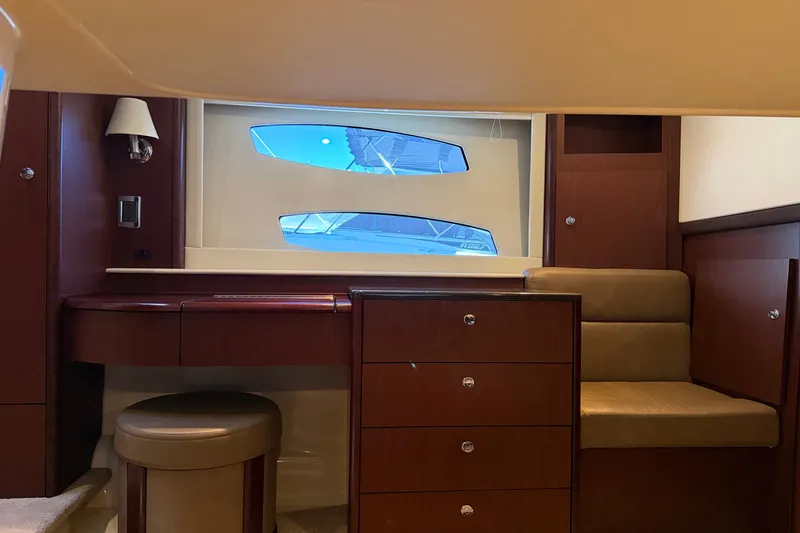 Slide: The Image of Interior of a 2014 Meridian 441 Sedan with wood furnishings and a window. - 32