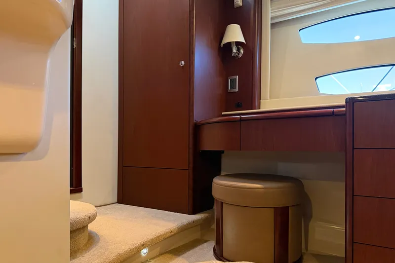Slide: The Image of Interior of a 2014 Meridian 441 Sedan with elegant wood furnishings and carpeted flooring. - 33