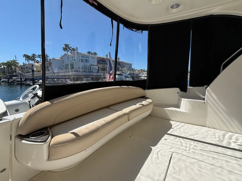 Slide: The Image of The image shows the cockpit of a 2014 Meridian 441 Sedan with a beige seating area. - 5