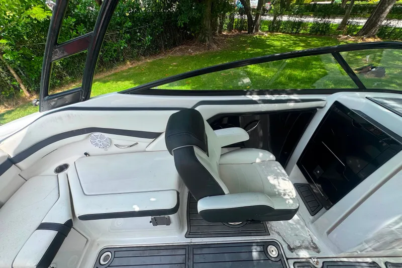 Slide: The Image of Interior of a 2015 Yamaha Boats AR240, featuring sleek seating and modern design. - 37