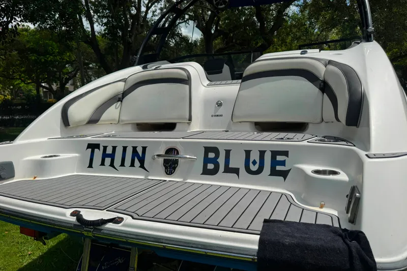 Slide: The Image of 2015 Yamaha Boats AR240 with "Thin Blue" text on the rear deck. - 12