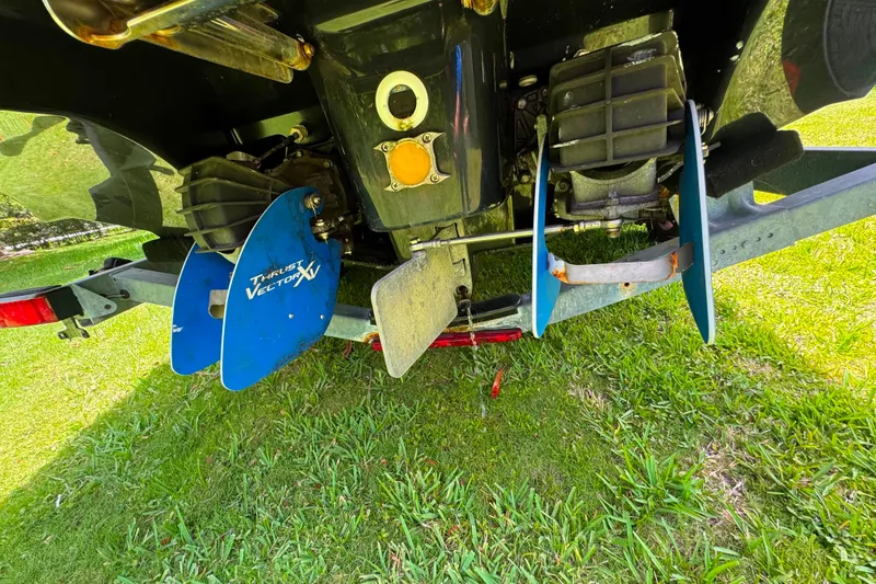 Slide: The Image of Close-up of 2015 Yamaha AR240 boat's thrust vector fins on grass. - 39