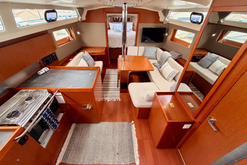 Slide: The Image of Luxurious interior of a 2017 Beneteau Oceanis 41.1 yacht with modern amenities and cozy seating. - 59
