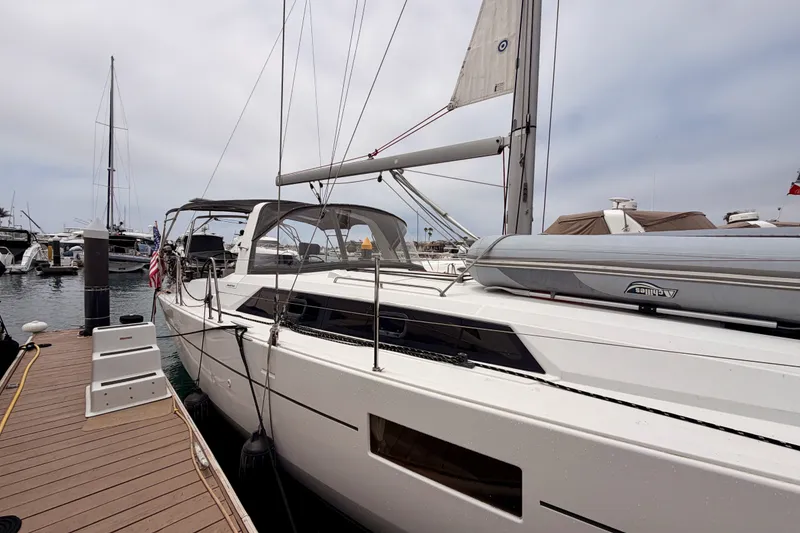 Slide: The Image of 2017 Beneteau Oceanis 41.1 yacht docked at marina, showcasing sleek design and modern features. - 10