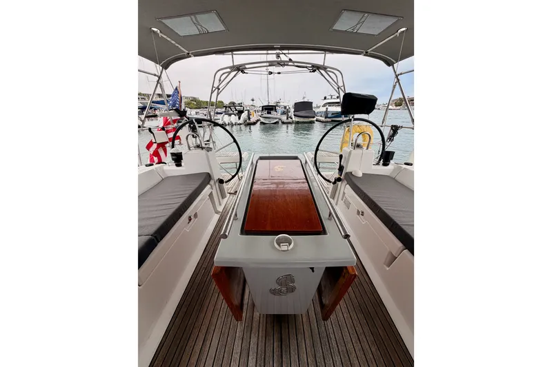 Slide: The Image of Cockpit view of 2017 Beneteau Oceanis 41.1 sailboat docked in a marina. - 29