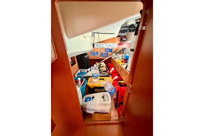 Slide: The Image of Interior storage area of 2017 Beneteau Oceanis 41.1 yacht with equipment and supplies. - 69