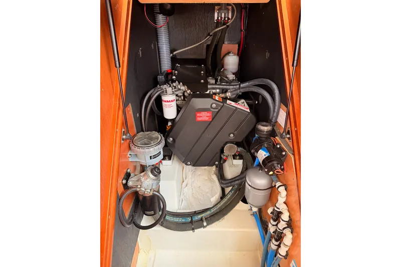 Slide: The Image of Engine compartment of a 2017 Beneteau Oceanis 41.1 sailboat, featuring Yanmar components. - 109