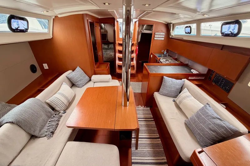 Slide: The Image of Luxurious interior of 2017 Beneteau Oceanis 41.1 yacht with cozy seating and modern kitchen. - 104