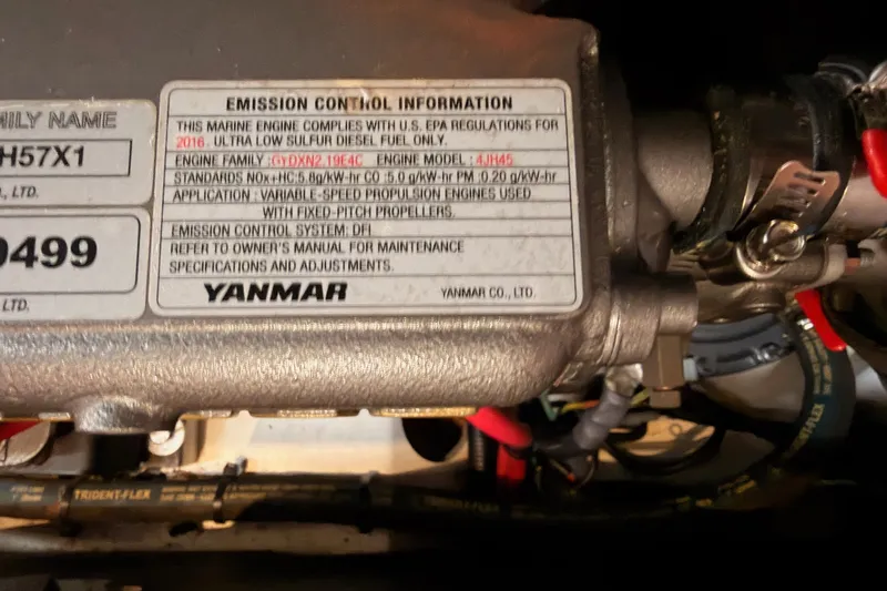 Slide: The Image of Yanmar engine emission control label on 2017 Beneteau Oceanis 41.1 sailboat. - 112