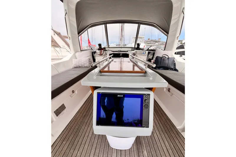 Slide: The Image of 2017 Beneteau Oceanis 41.1 yacht cockpit with navigation equipment and seating. - 42