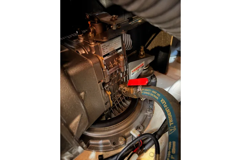 Slide: The Image of Engine compartment of a 2017 Beneteau Oceanis 41.1 sailboat, featuring Yanmar components. - 110
