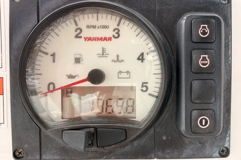 Slide: The Image of Yanmar RPM gauge on a 2017 Beneteau Oceanis 41.1 sailboat dashboard. - 39