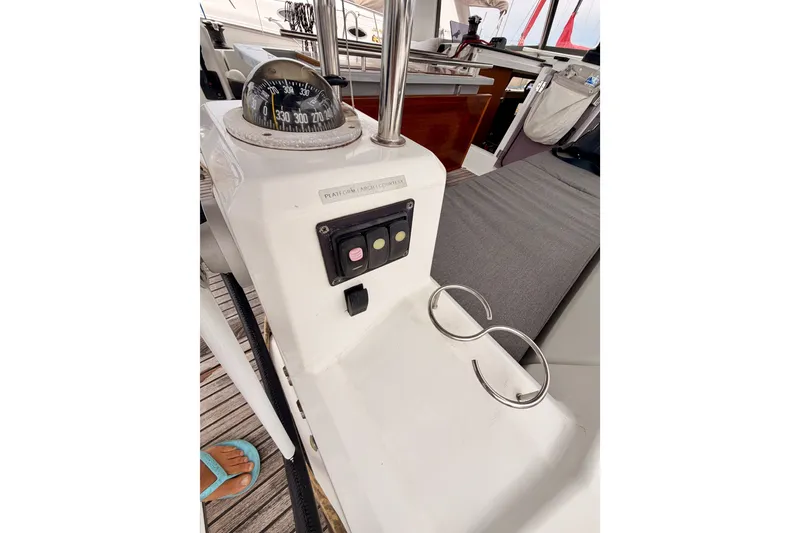 Slide: The Image of Cockpit of 2017 Beneteau Oceanis 41.1 sailboat with compass and control panel. - 46