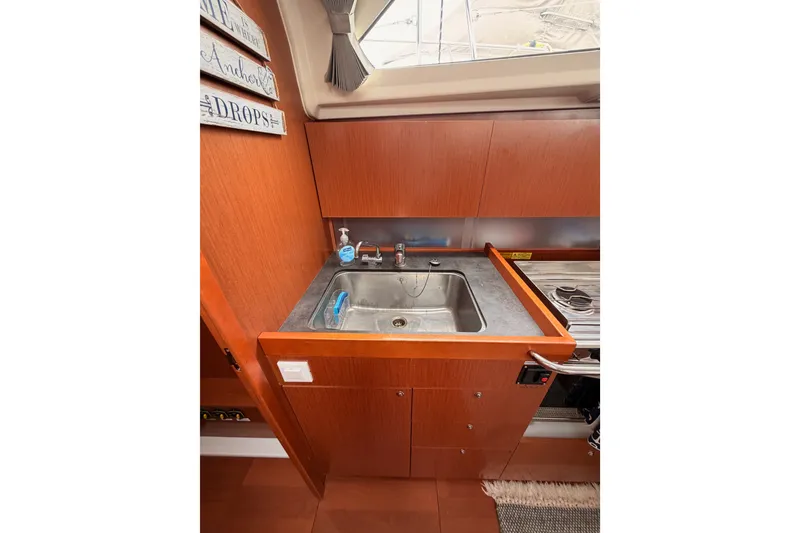 Slide: The Image of Galley sink area in 2017 Beneteau Oceanis 41.1 yacht interior. - 65