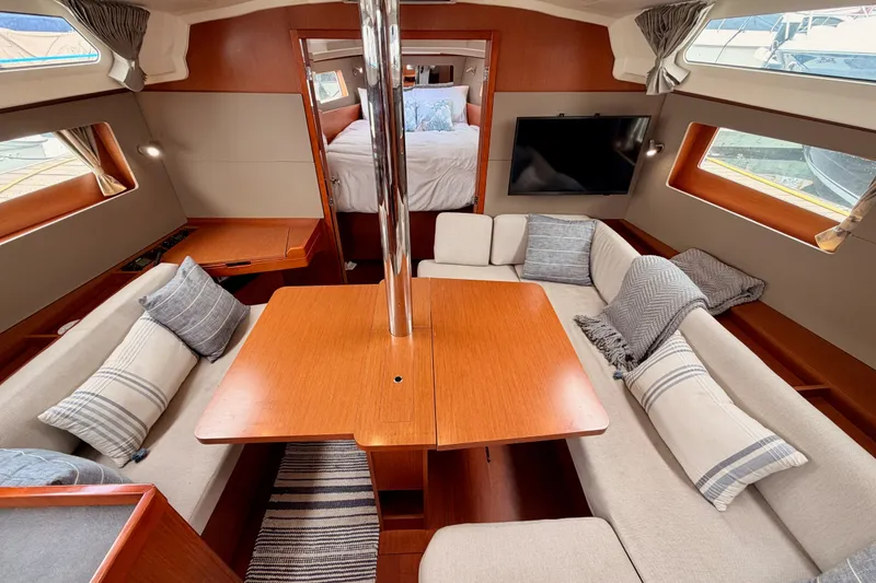 Slide: The Image of Luxurious interior of 2017 Beneteau Oceanis 41.1 yacht with cozy seating and elegant wood finishes. - 88