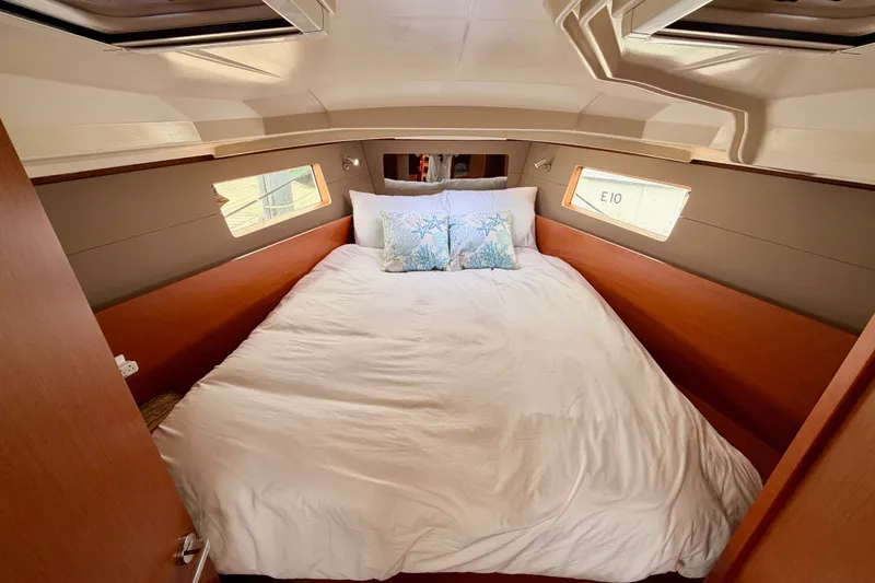 Slide: The Image of Cozy cabin interior of 2017 Beneteau Oceanis 41.1 yacht with comfortable bedding. - 97