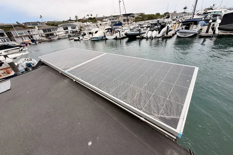 Slide: The Image of Solar panels on a 2017 Beneteau Oceanis 41.1 yacht docked in a marina. - 26