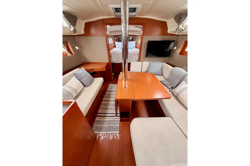 Slide: The Image of Luxurious interior of 2017 Beneteau Oceanis 41.1 yacht with cozy seating and elegant wood finishes. - 87