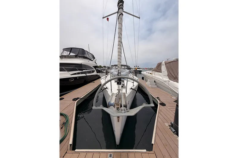 Slide: The Image of 2017 Beneteau Oceanis 41.1 sailboat docked at marina, front view. - 2