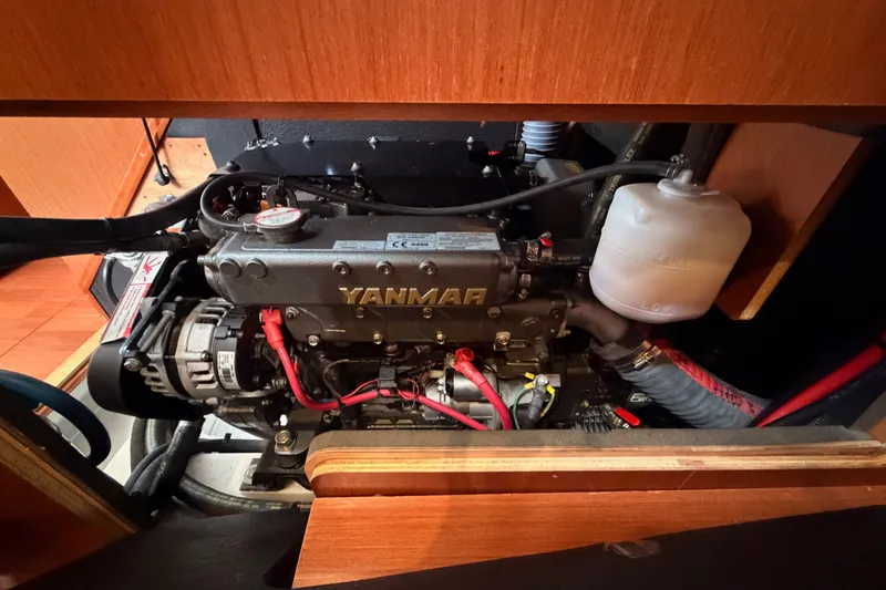 Slide: The Image of Yanmar engine in a 2017 Beneteau Oceanis 41.1 sailboat, showcasing detailed mechanics. - 113