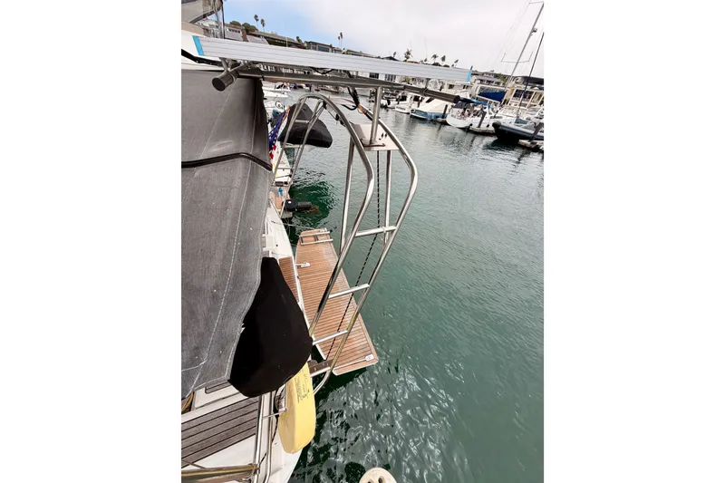 Slide: The Image of Beneteau Oceanis 41.1 yacht, 2017 model, docked with solar panel and swim platform. - 27