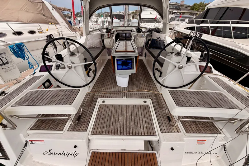 Slide: The Image of Cockpit of 2017 Beneteau Oceanis 41.1 sailboat with dual steering wheels and teak decking. - 36