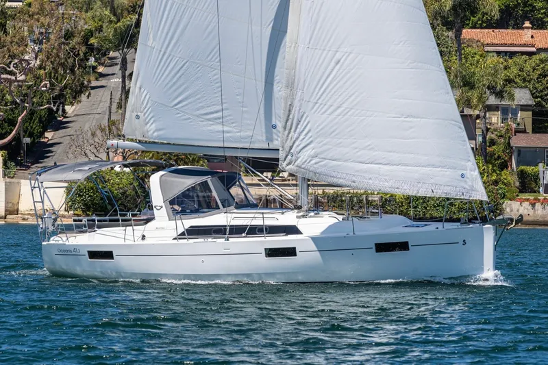 The Image of 2017 Beneteau Oceanis 41.1 sailing yacht on water, showcasing sleek design and white sails. - 0