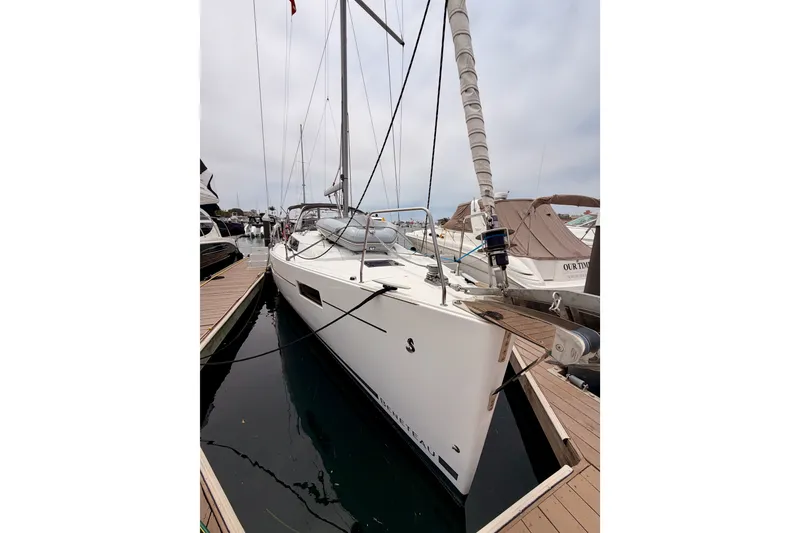 Slide: The Image of 2017 Beneteau Oceanis 41.1 sailboat docked at marina, showcasing sleek design and modern features. - 8